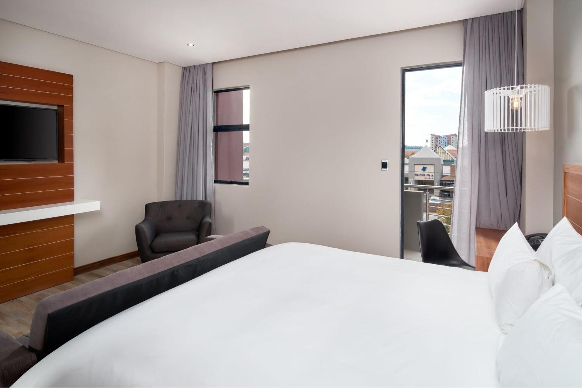 Protea Hotel By Marriott Pretoria Hatfield Habitación foto